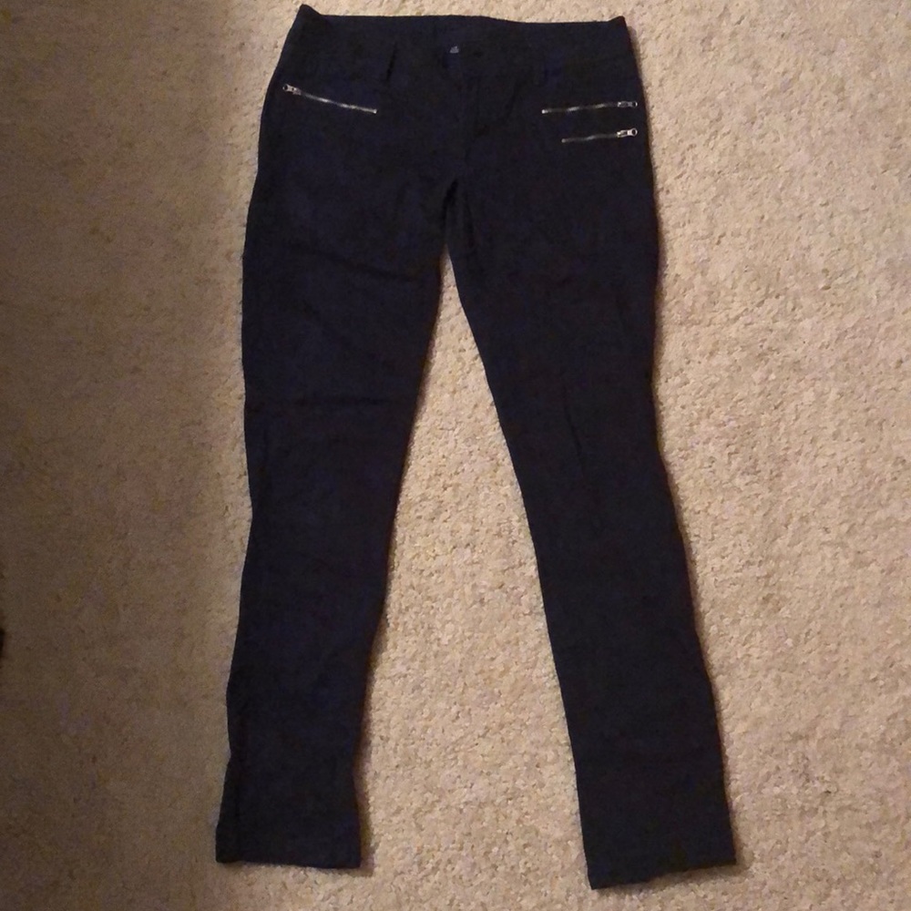 Navy blue jeans with zippers
